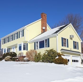 House roof with uneven snow melt and possible ice damming from Fiberlite